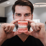 Dr. with teeth model