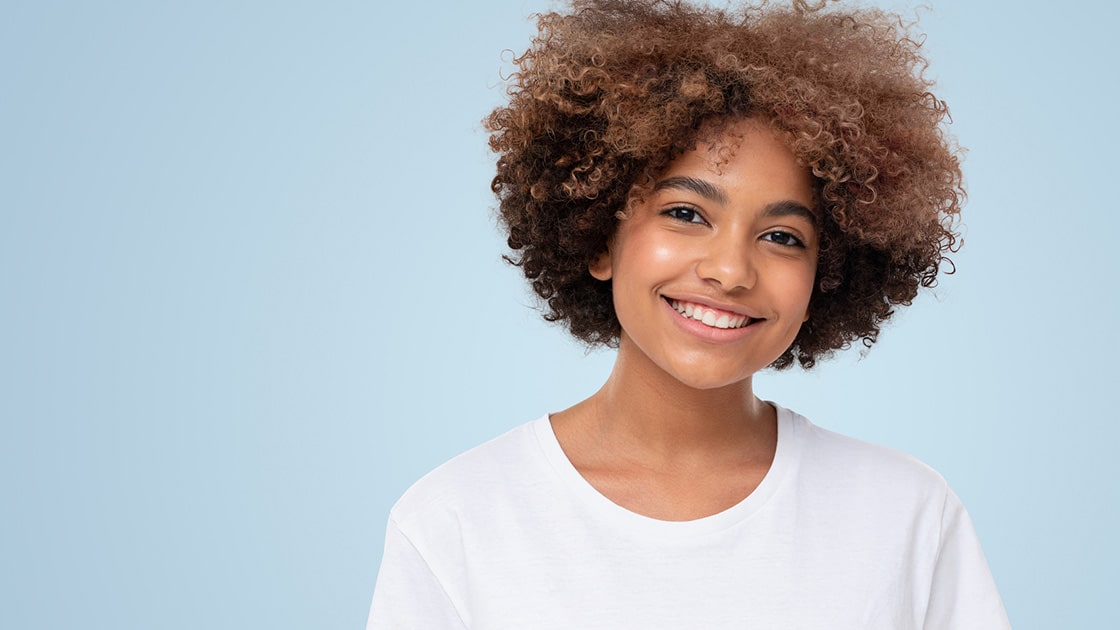 Teen with white teeth